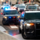 cop cars with lights on