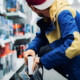 man stealing electronics
