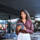 business woman looking at an ipad