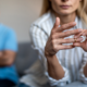 woman taking off ring