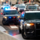 cop cars with lights on