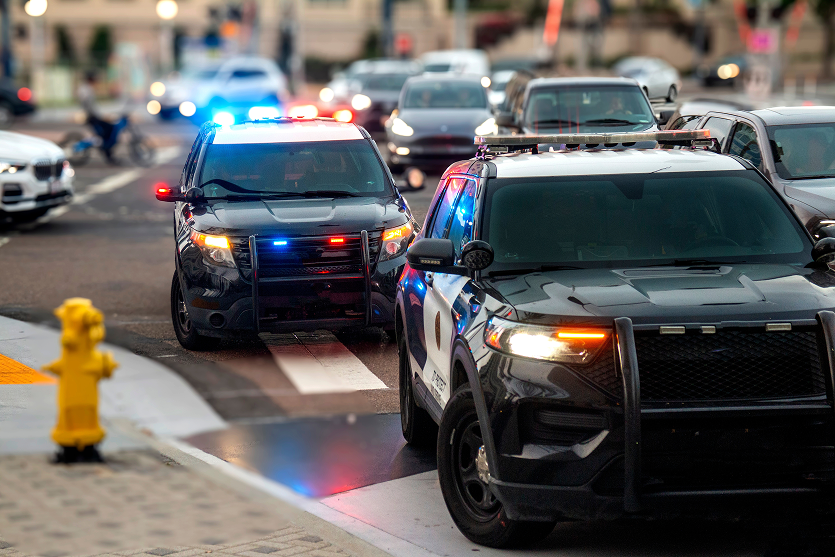 cop cars with lights on