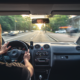 behind the shoulder of a guy driving