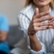 woman taking off ring